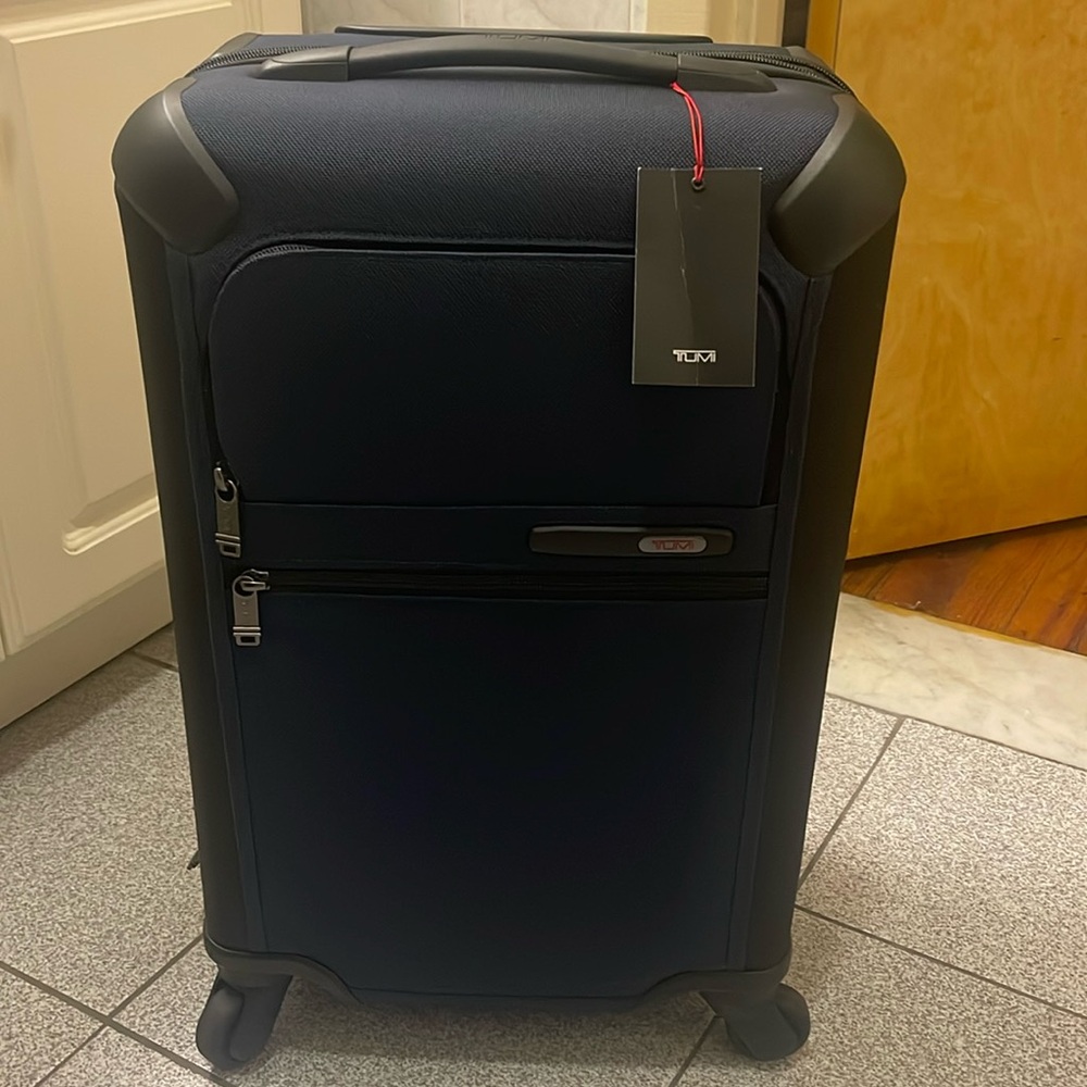 Tumi ALPHA International Expandable 4 Wheeled Carry-On Ballistic Blue